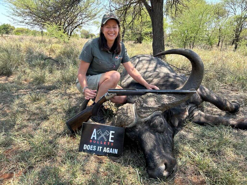 Tamlyn with her trophy harvested on a Cape buffalo hunt.